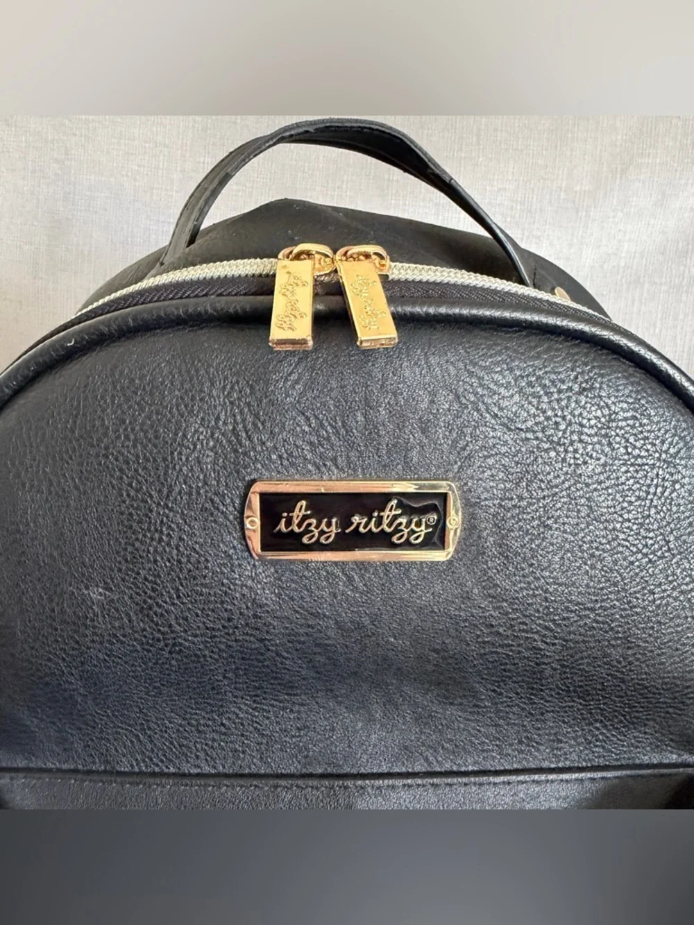 Itzy Ritzy Mini Black Faux Leather diaper Backpack